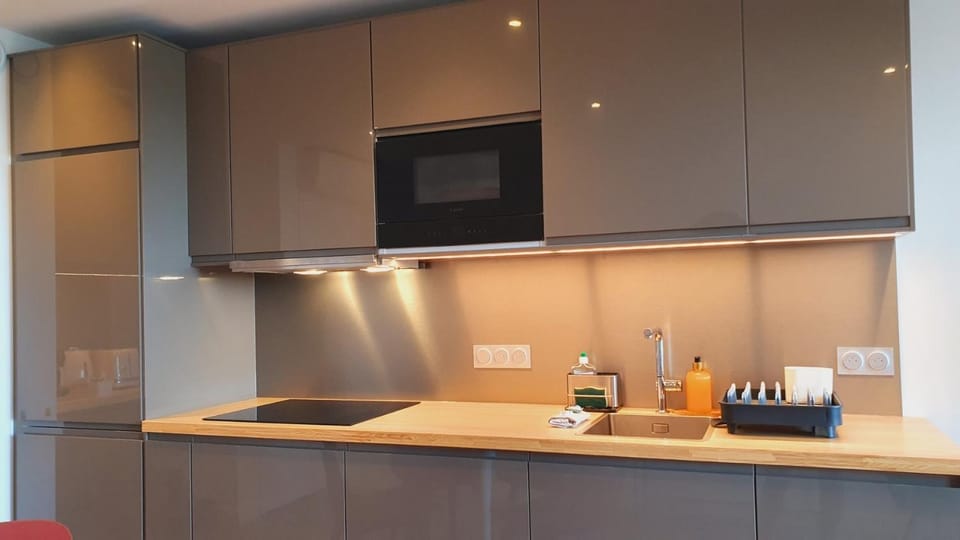 dishwasher, microwave, stove, washing machine, kitchen