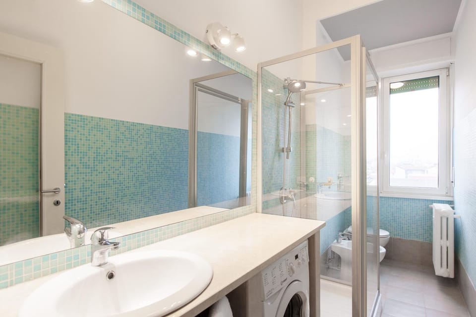 Shower, Toilet, Bathroom, bidet, towels, washing machine