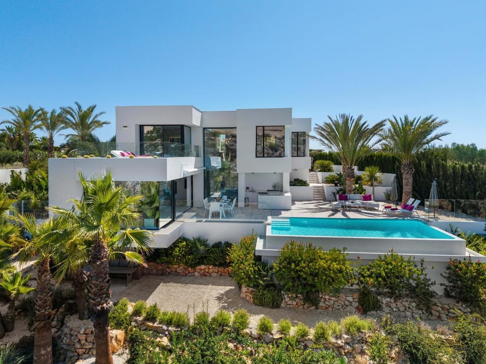 Property building, Patio, Day, Living room, Seating area, Pool view, Swimming pool, sunbed
