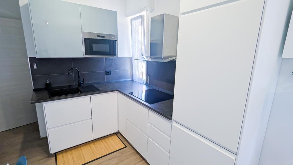 Kitchen or kitchenette, stove