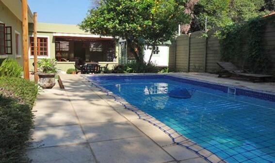 Property building, Day, Garden, Garden view, Pool view, Swimming pool, sunbed