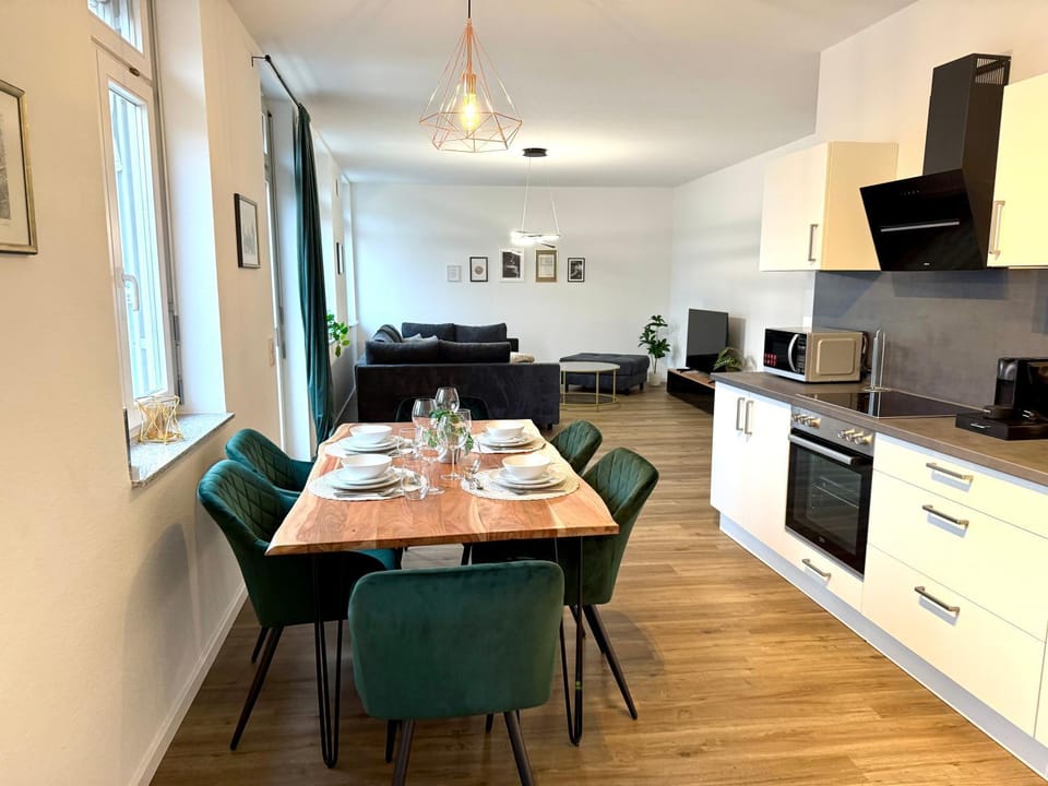Living room, Seating area, Dining area, dishwasher, stove, kitchen