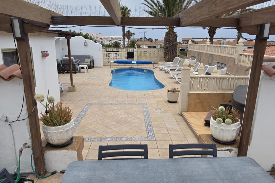 Patio, Seating area, Pool view, Swimming pool