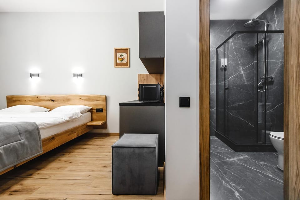 Shower, Toilet, Bed, Bathroom, Photo of the whole room, Bedroom, microwave