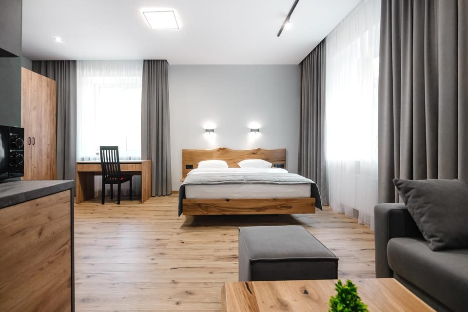Bed, Living room, Photo of the whole room, Seating area, Bedroom, microwave, wardrobe