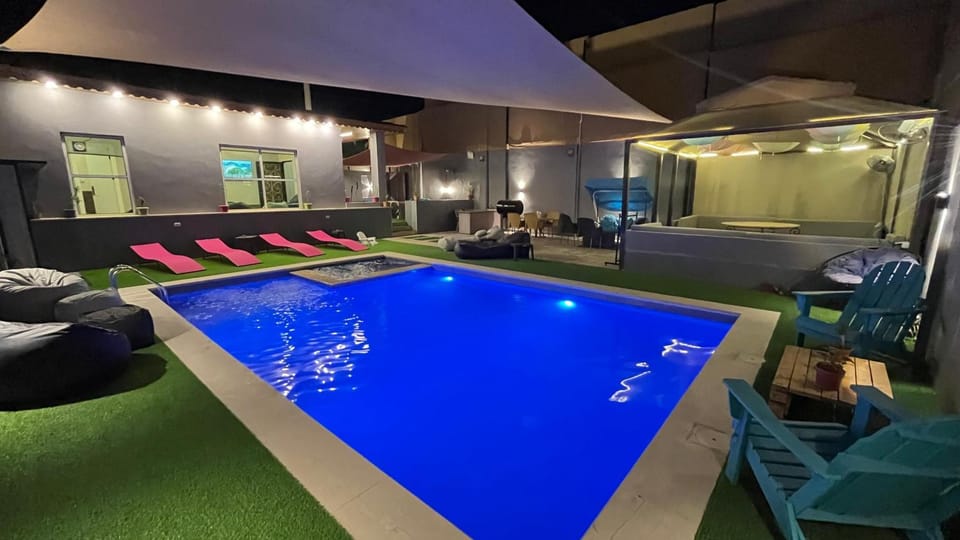 Night, Seating area, Pool view, Swimming pool, sunbed