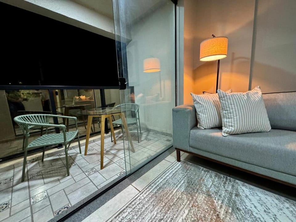 Night, View (from property/room), Balcony/Terrace, Living room, Seating area, Dining area