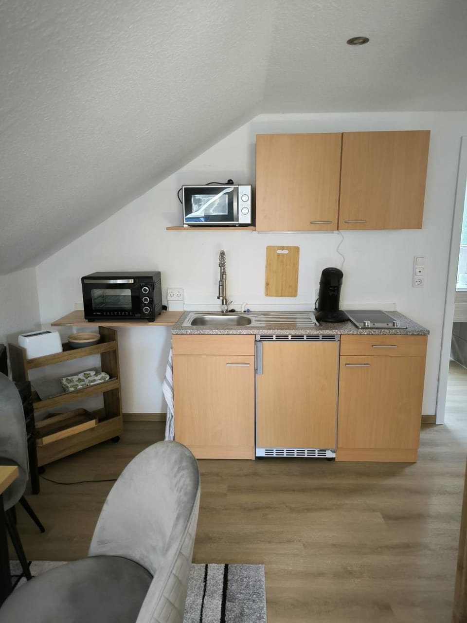 Kitchen or kitchenette, stove, toaster