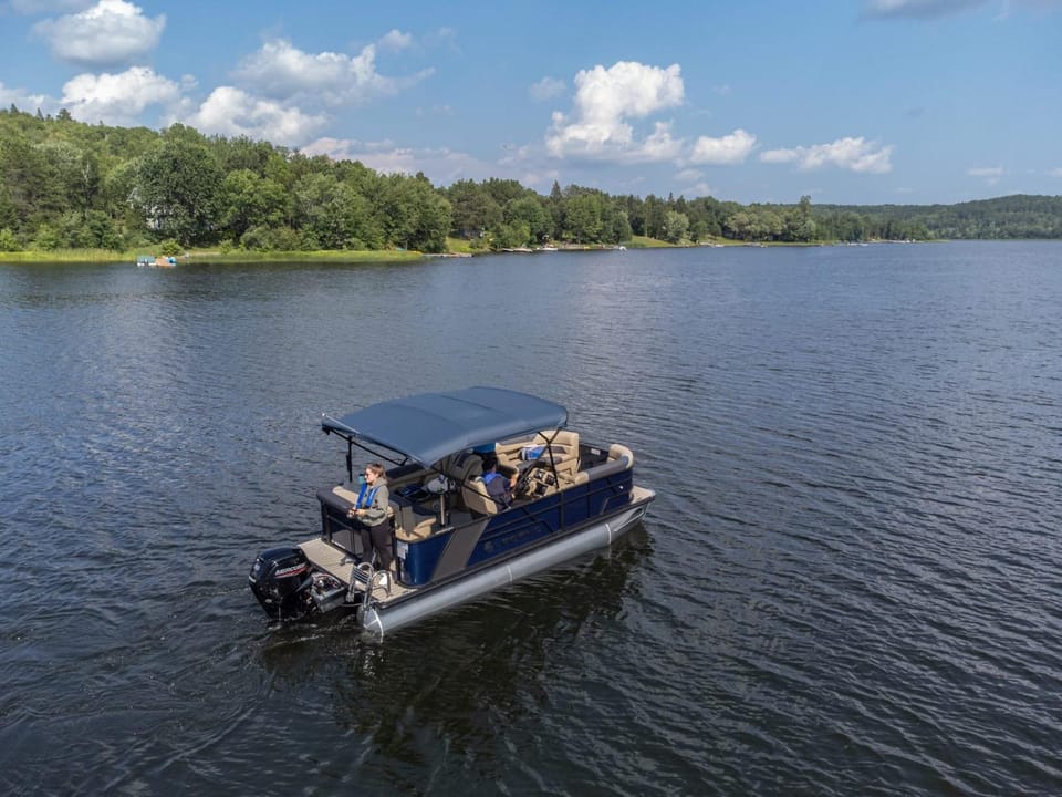 Private Boat Tour Montreal Docked boat in Boucherville