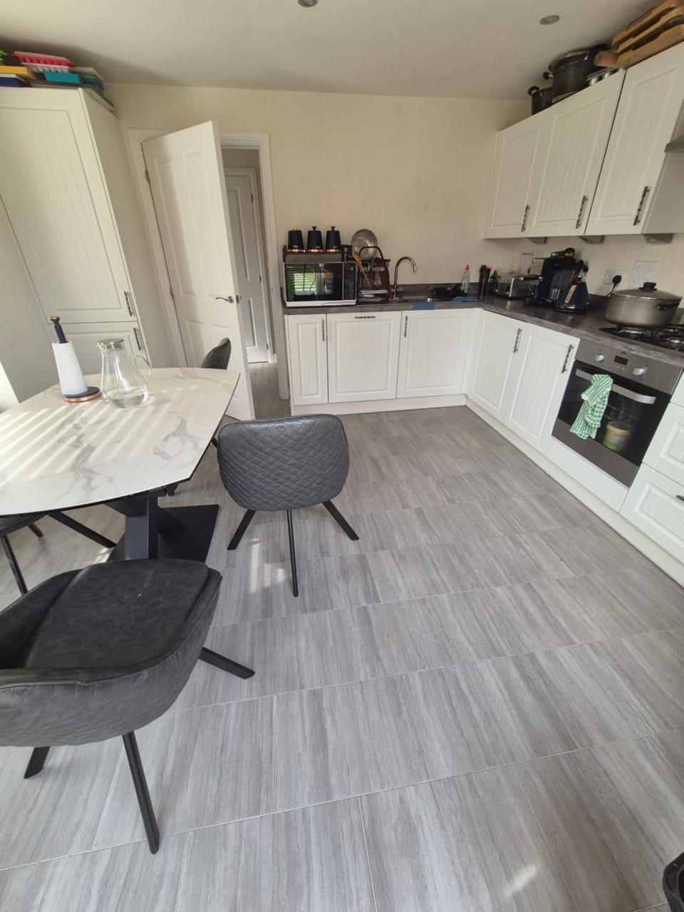 Kitchen or kitchenette, Dining area, dishwasher, oven, toaster