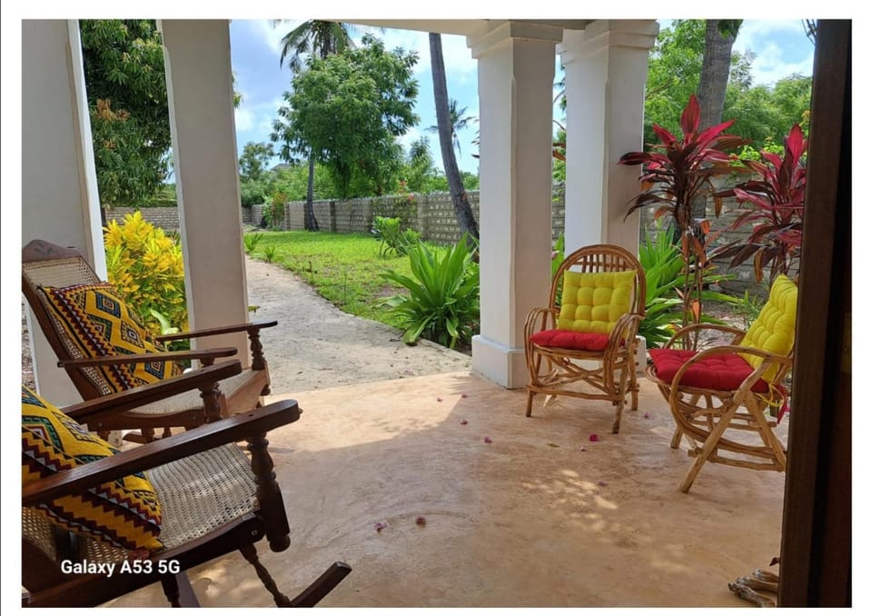 Property building, Patio, Garden, Seating area, Garden view