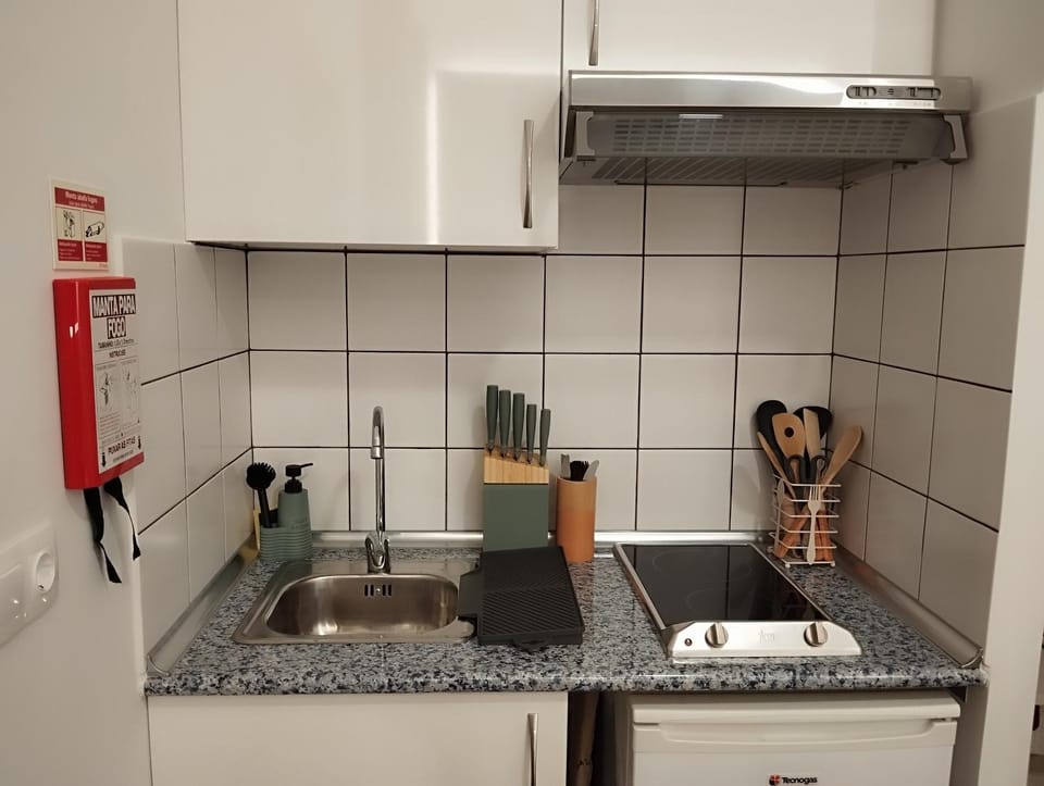 Kitchen or kitchenette, stove