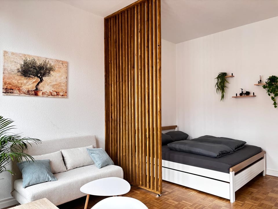 Bed, Living room, Seating area, Bedroom