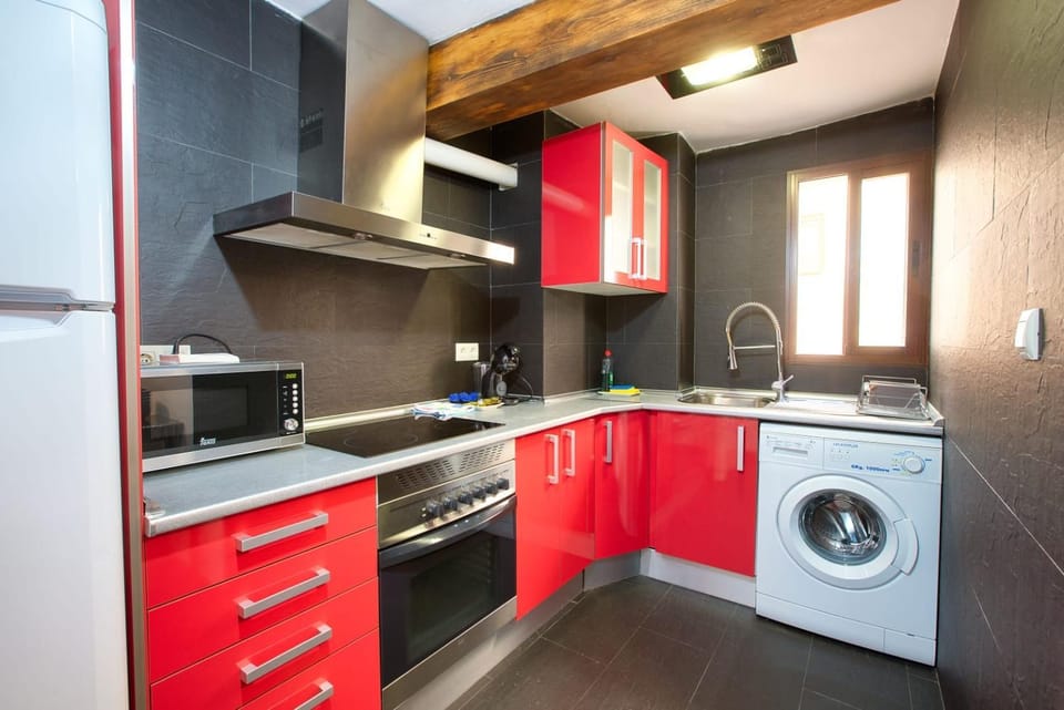 Kitchen or kitchenette, stove, washing machine