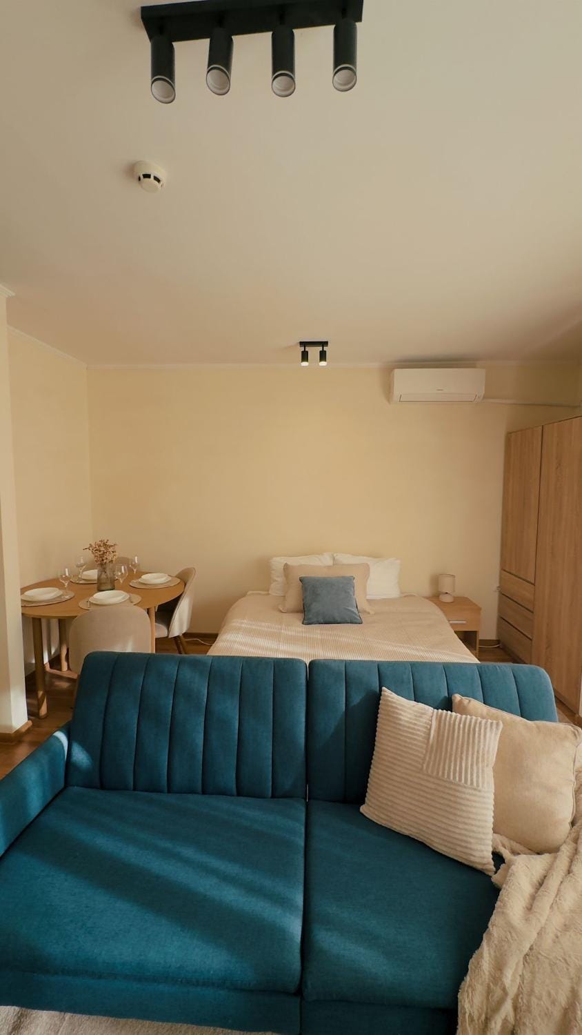 Bed, Living room, Seating area, Bedroom