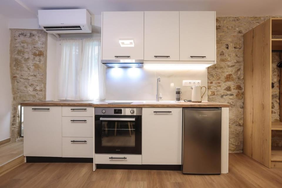 Kitchen or kitchenette, stove