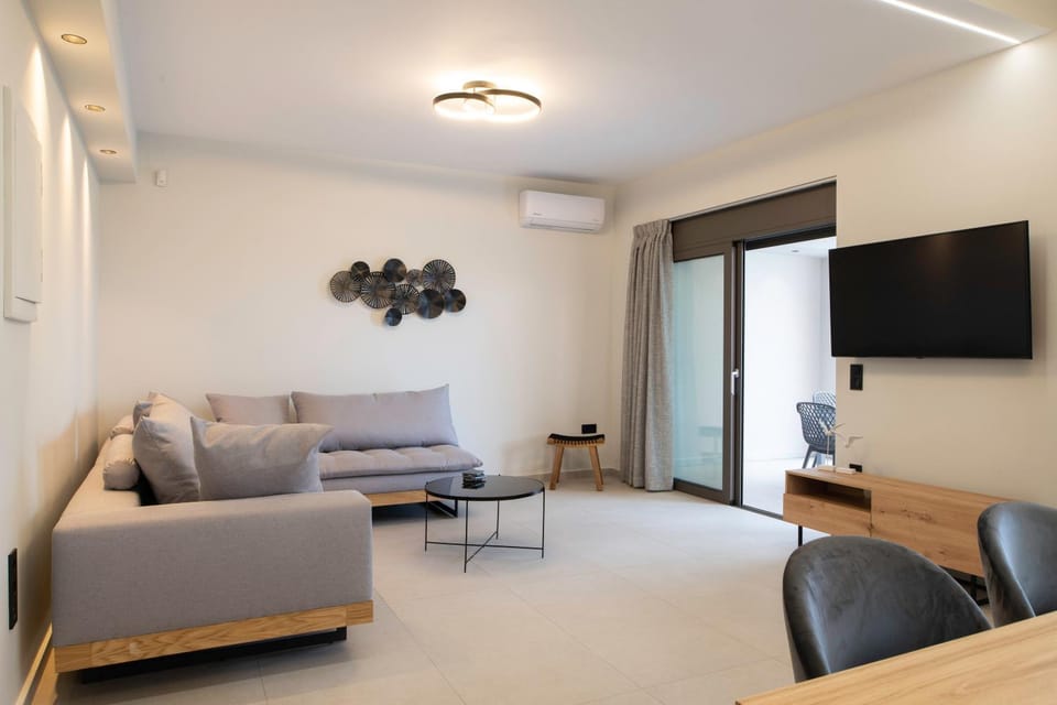 TV and multimedia, Living room, Seating area, Pool view, Pool view, air conditioner