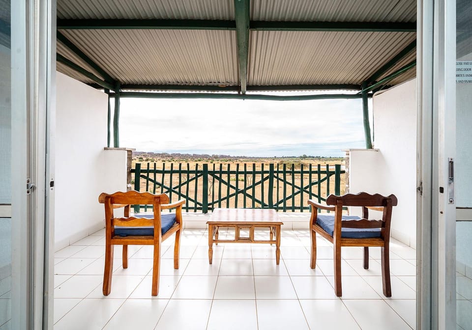 Property building, View (from property/room), Balcony/Terrace, Seating area, Landmark view