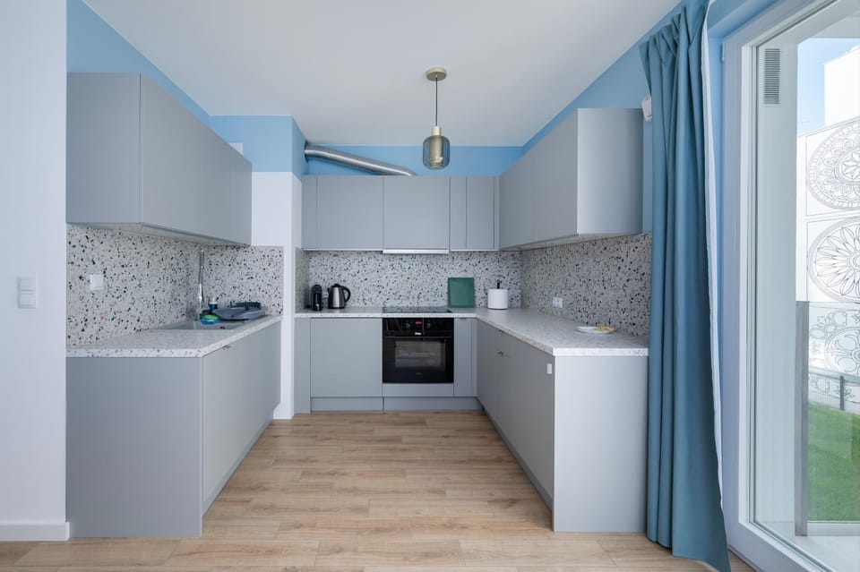 Kitchen or kitchenette, oven, stove