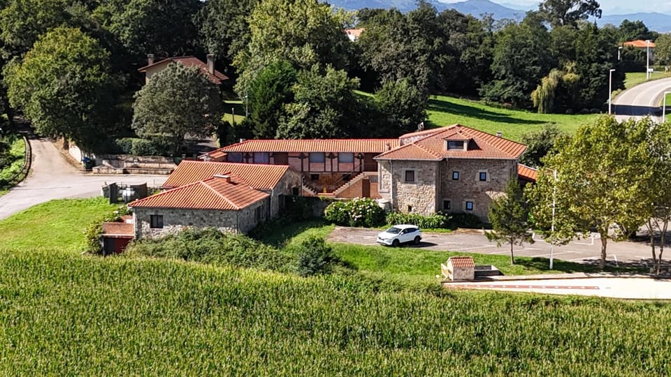 Property building, Natural landscape, Bird's eye view, Street view, Parking