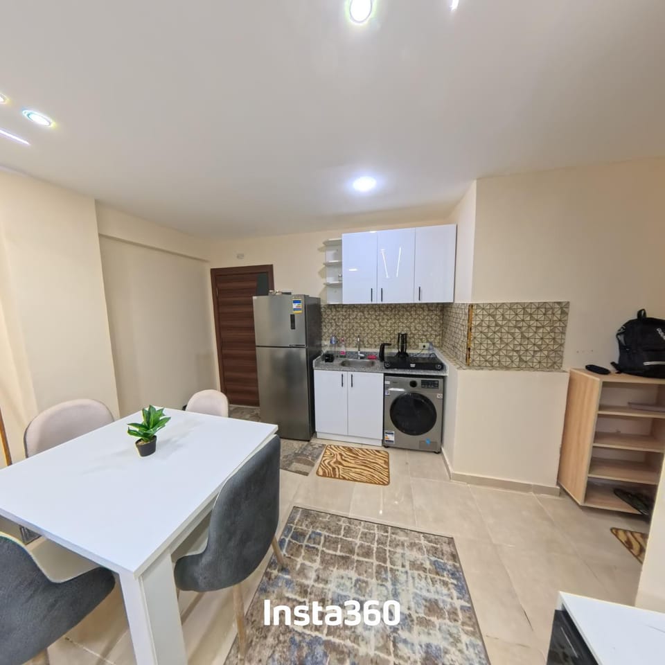 Kitchen or kitchenette, Dining area, dishwasher, minibar, washing machine, dryer