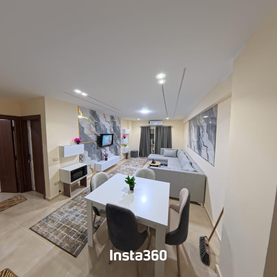 TV and multimedia, Living room, Photo of the whole room, Seating area, Dining area