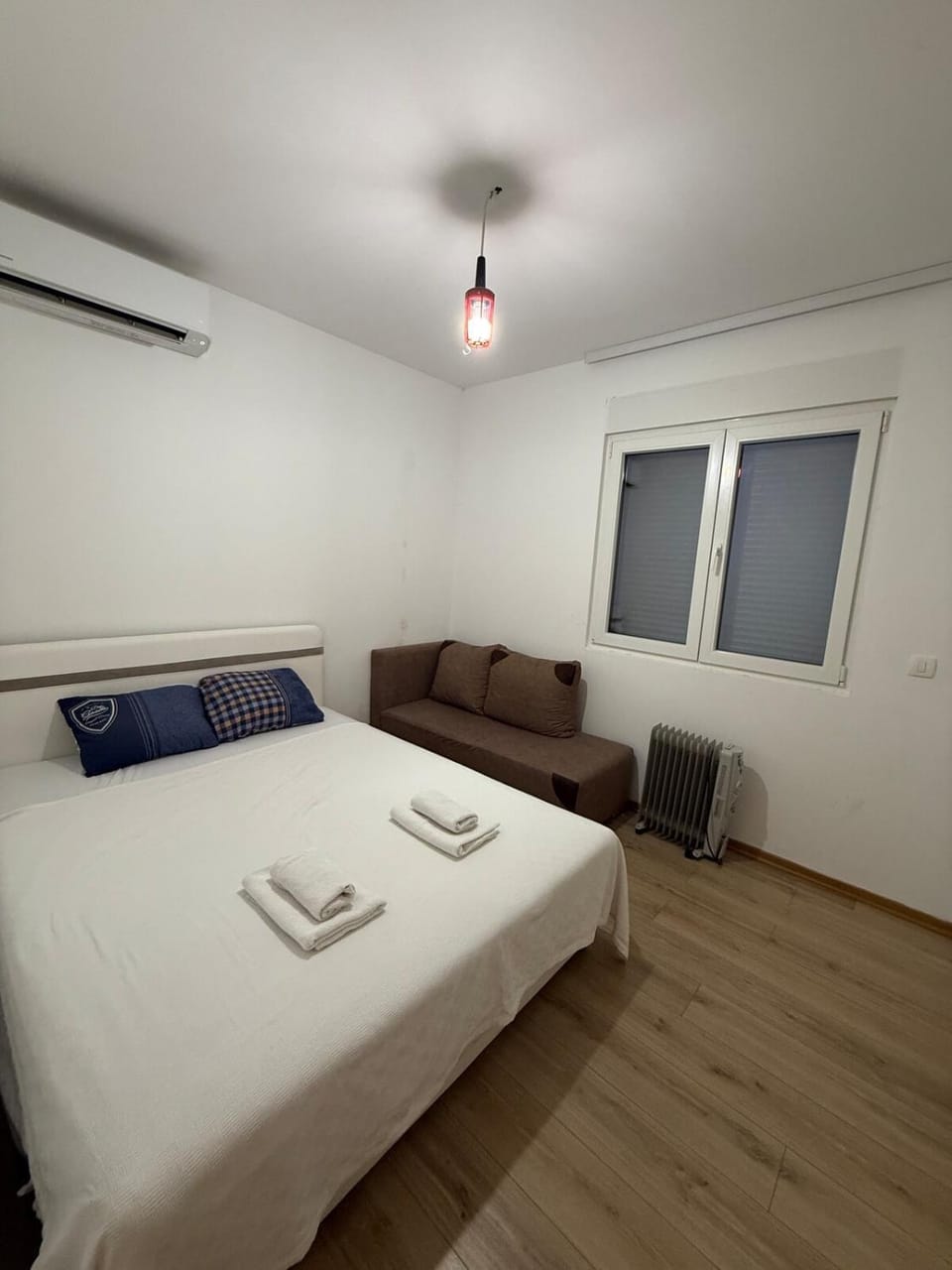 Bed, Photo of the whole room, Bedroom, towels, air conditioner