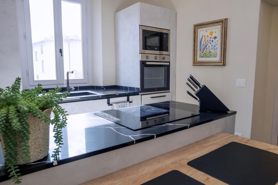 Kitchen or kitchenette, microwave, oven, stove, kitchen