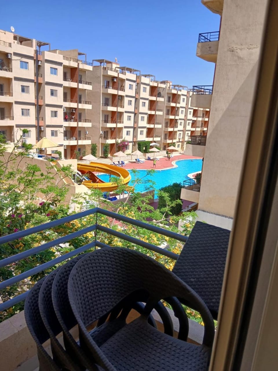 Property building, Communal lounge/ TV room, Day, View (from property/room), Balcony/Terrace, Evening entertainment, Pool view, Swimming pool