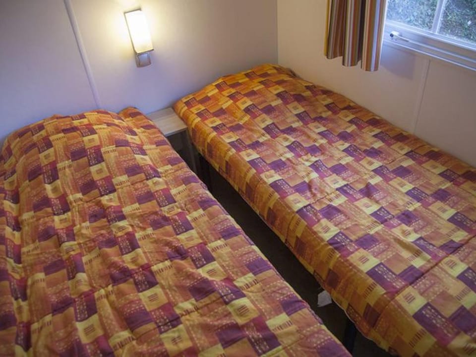 Mobil home cosy avec terrasse au camping de Naucelle - API-1-52-585 Campground/ 
RV Resort in Auvergne-Rhône-Alpes