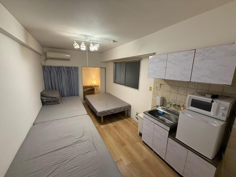 23 Dotonbori 5-minute walk, bed for 3 generations, maximum 6 people Apartment in Osaka