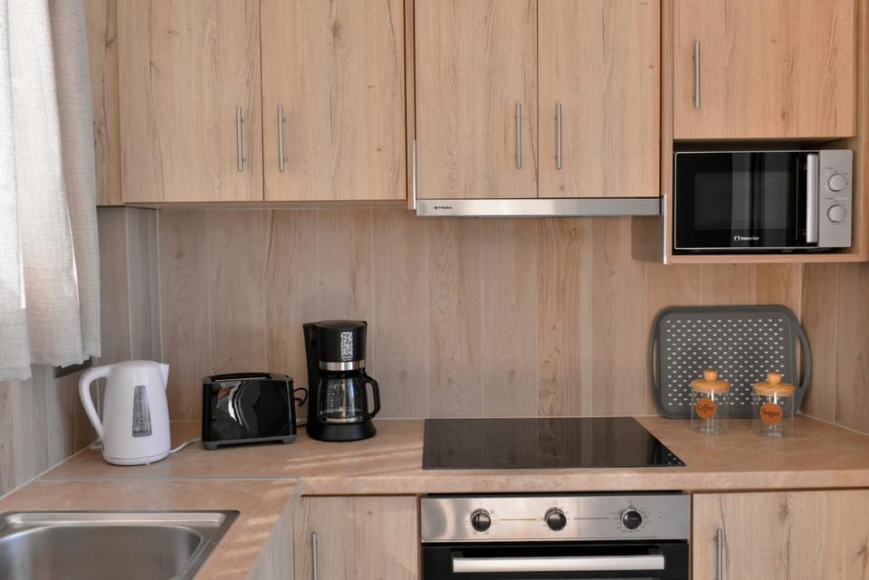 Kitchen or kitchenette, oven, toaster, kitchen