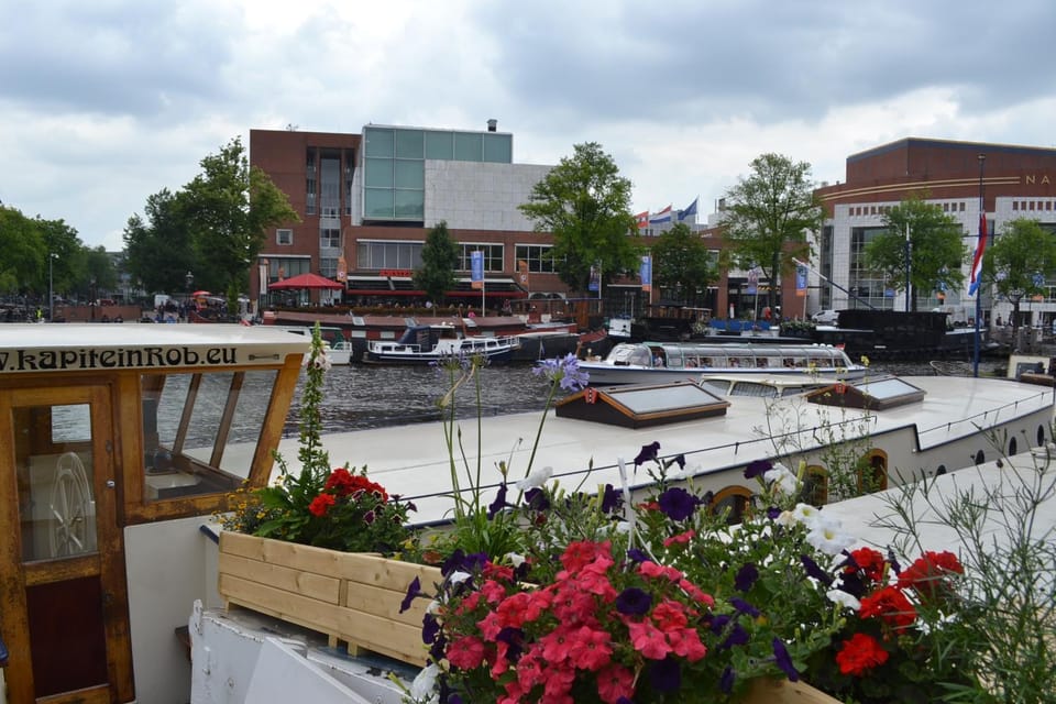 art deco houseboat on super location Docked boat in Amsterdam