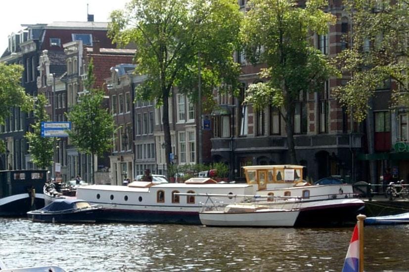 art deco houseboat on super location Docked boat in Amsterdam