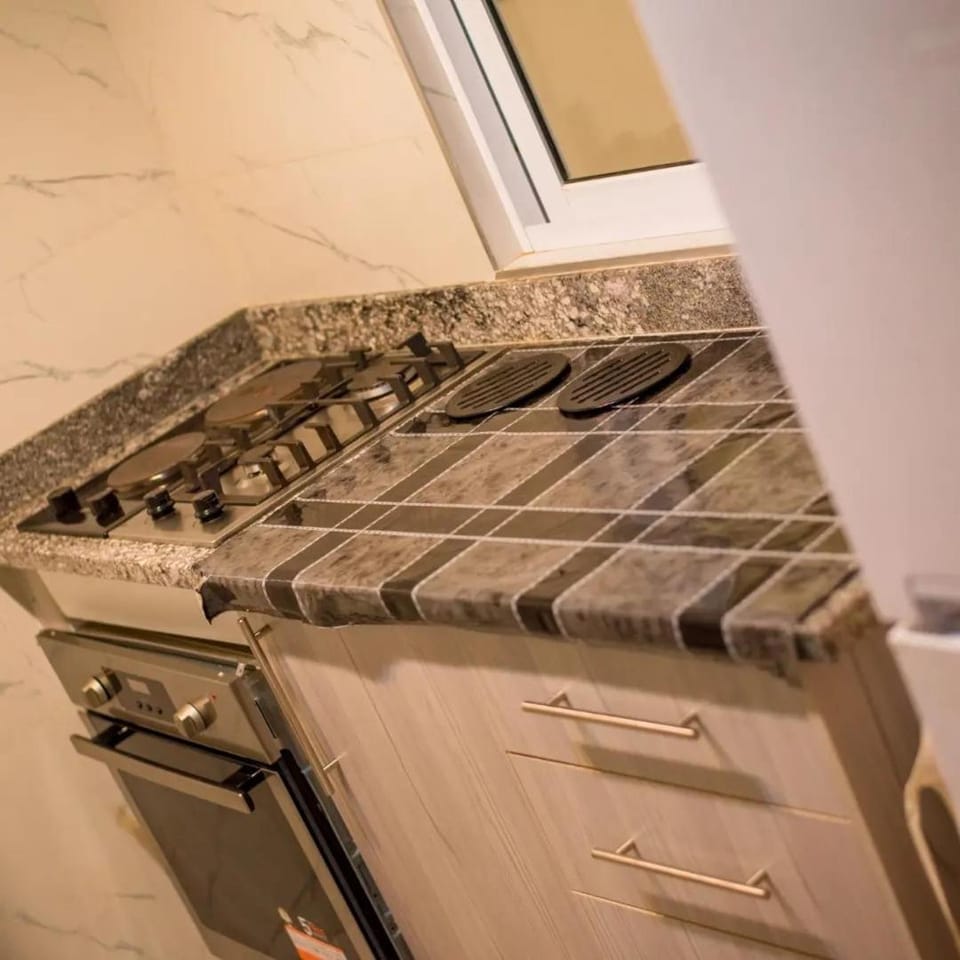 Kitchen or kitchenette, stove