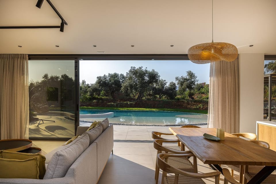 Patio, Day, Natural landscape, Living room, Seating area, Dining area, Pool view, Swimming pool, sunbed