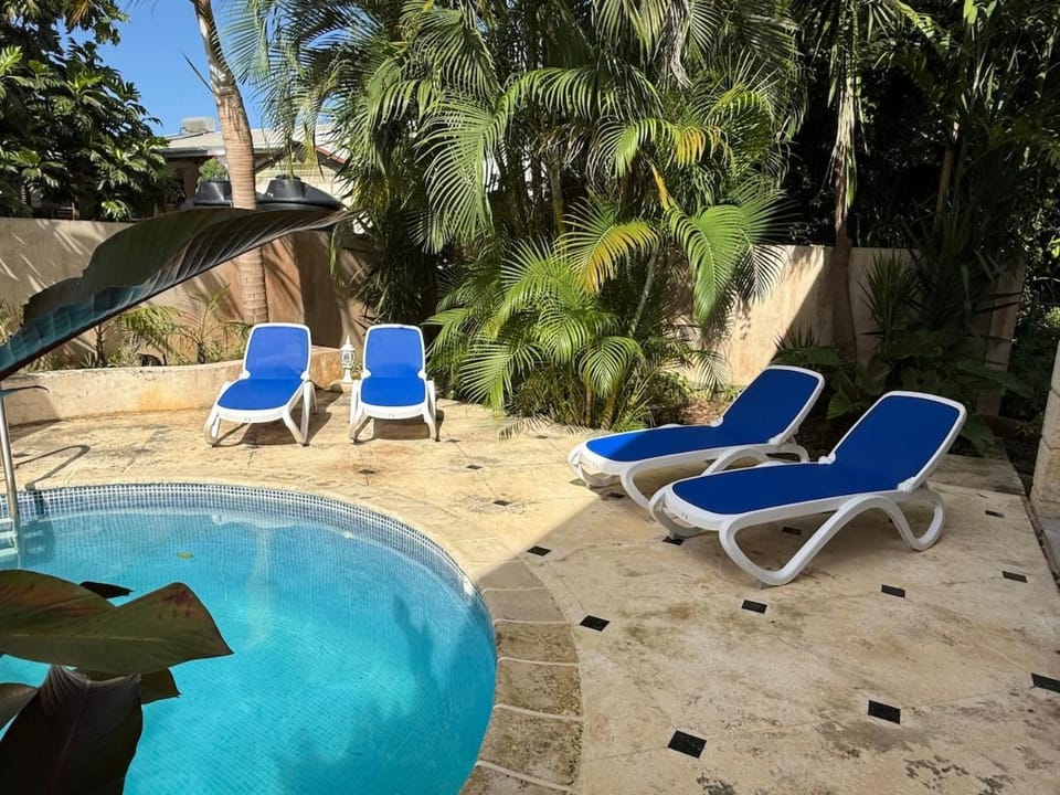 Swimming pool, sunbed
