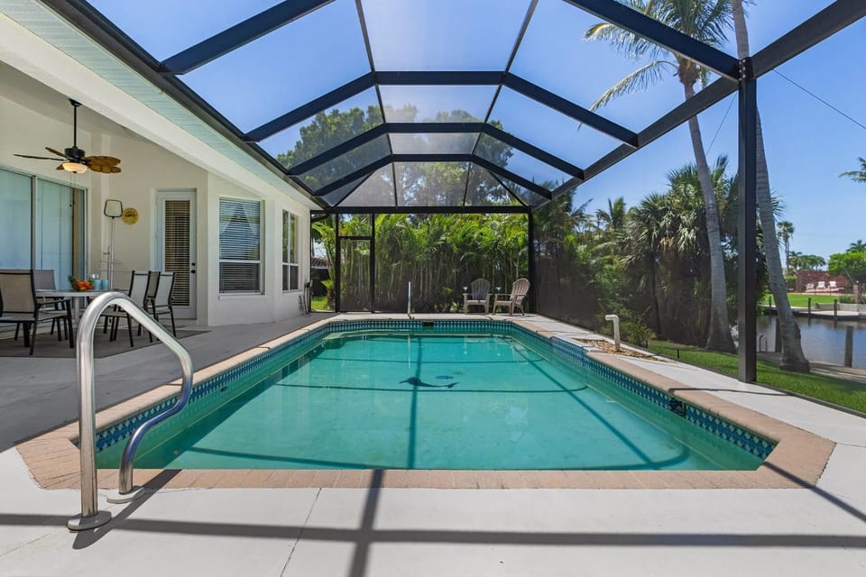 Waterfront Fun with Heated Pool, Private Dock & Gulf Access - Tropical Delight - Roelens House in Cape Coral