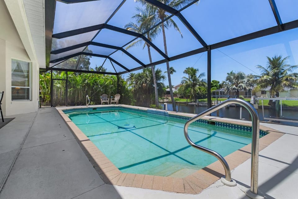 Waterfront Fun with Heated Pool, Private Dock & Gulf Access - Tropical Delight - Roelens House in Cape Coral