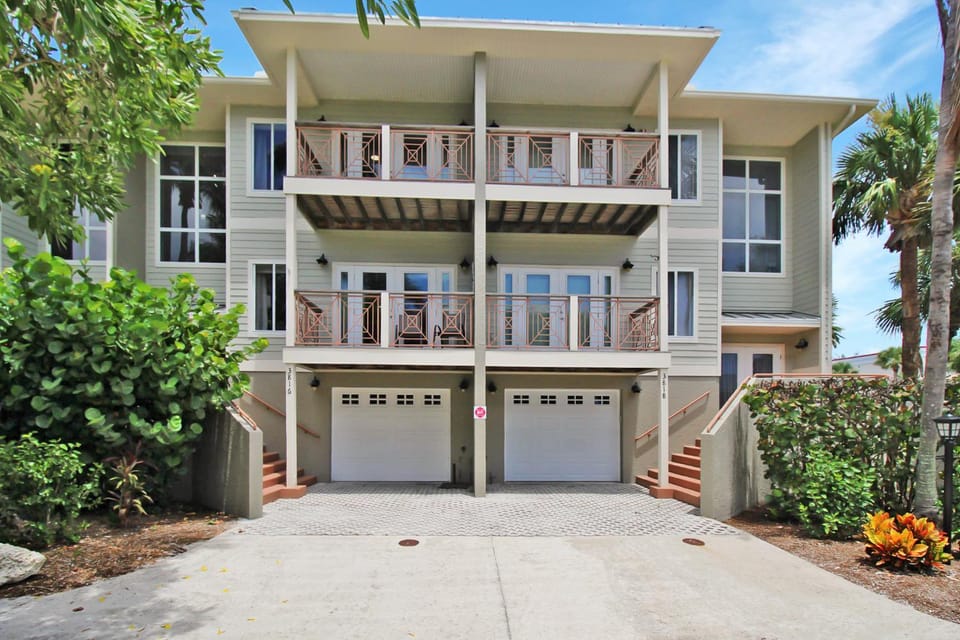 Shell Yeah 3 Story Condo On AMI House in Holmes Beach