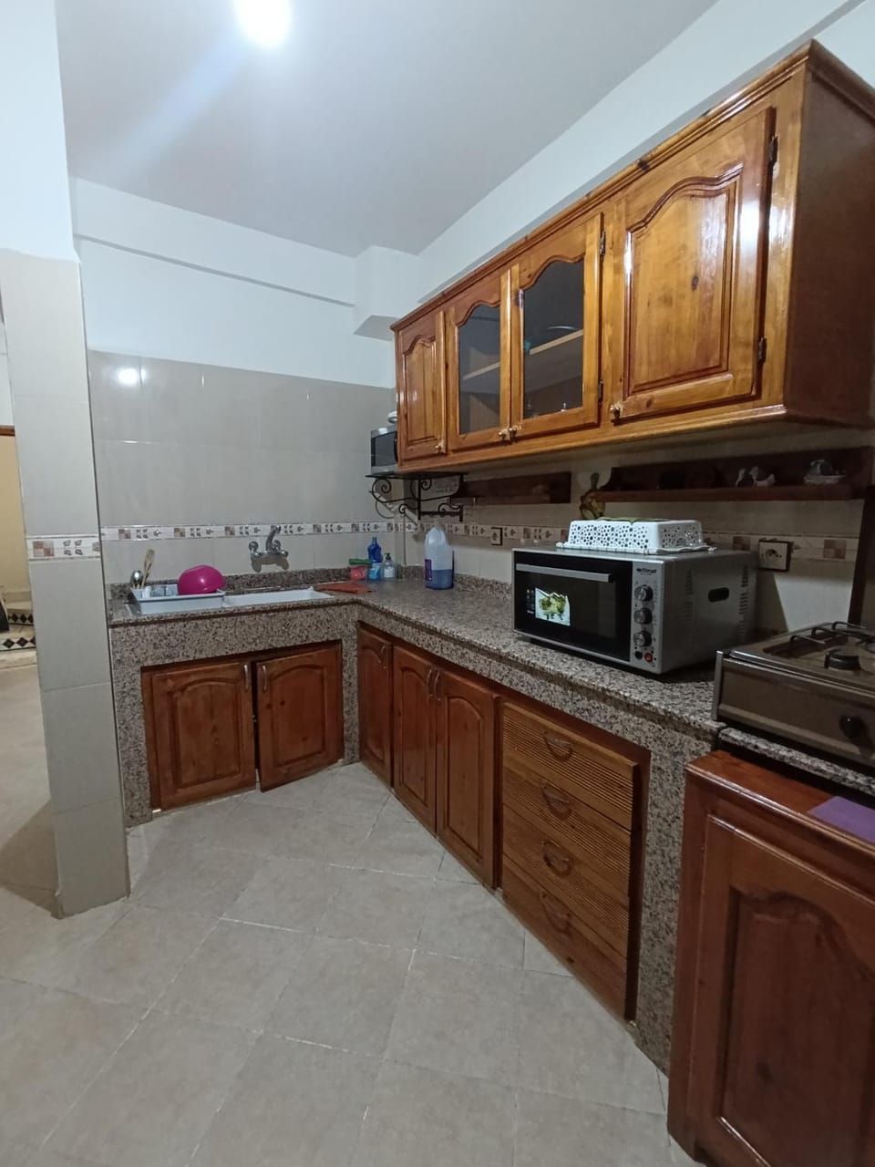 Kitchen or kitchenette, oven, stove, toaster