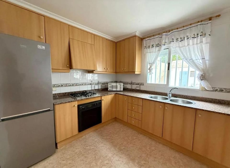 Kitchen or kitchenette, oven