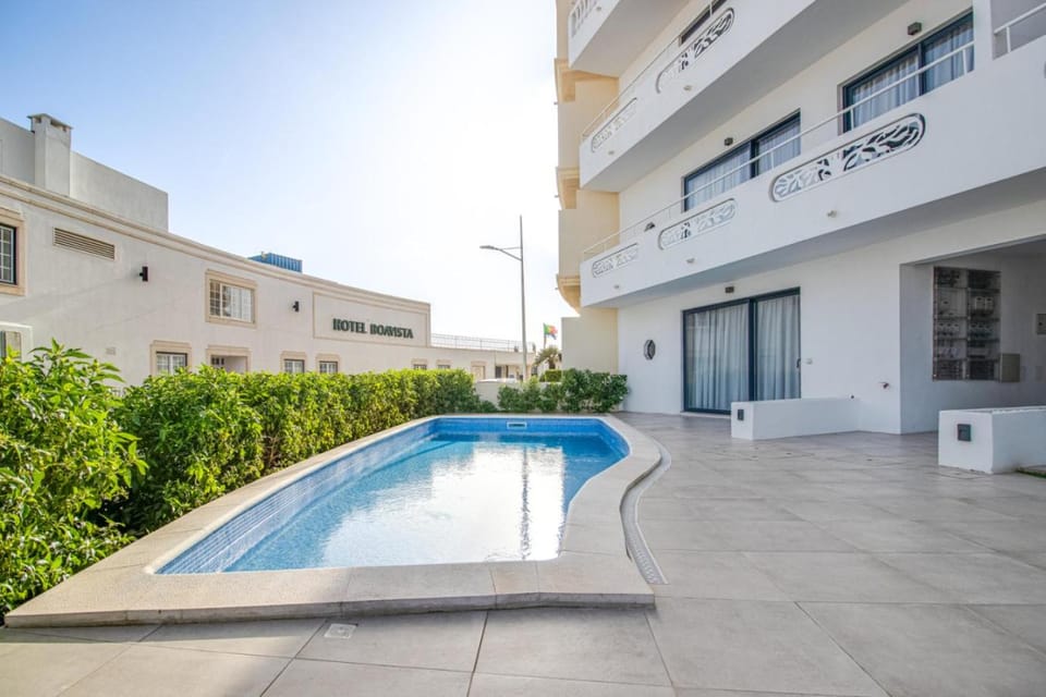 Property building, Day, Pool view, Swimming pool