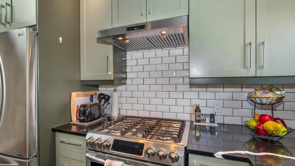 Kitchen or kitchenette, dishwasher, oven, stove, toaster
