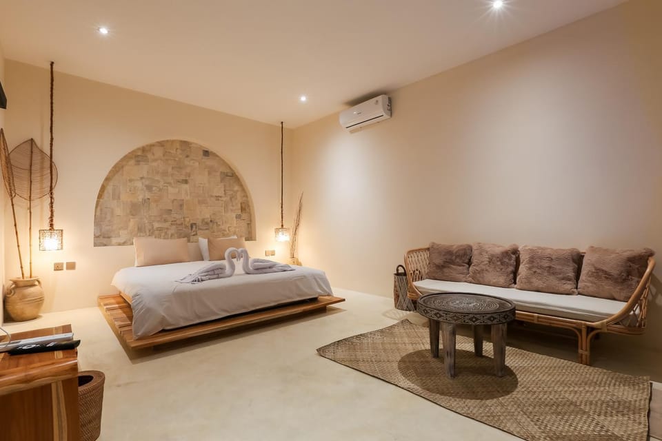 Bed, Living room, Seating area, Bedroom