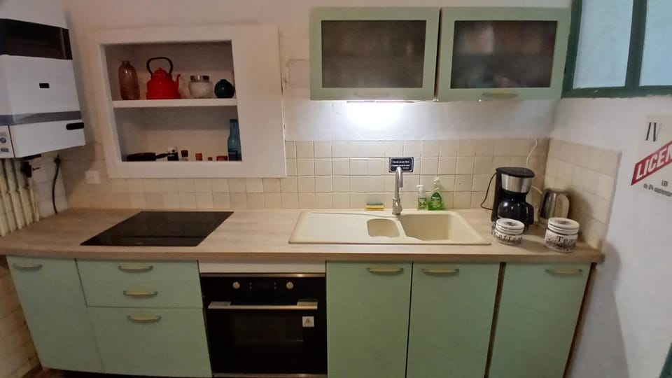 Kitchen or kitchenette, oven, stove, toaster