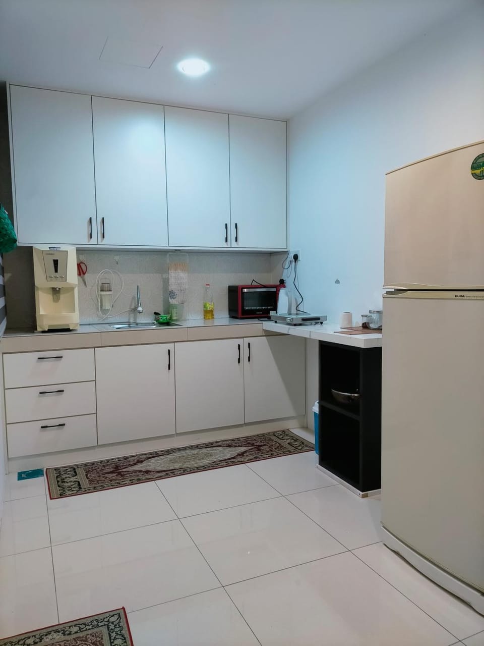 Kitchen or kitchenette, dishwasher, oven, stove