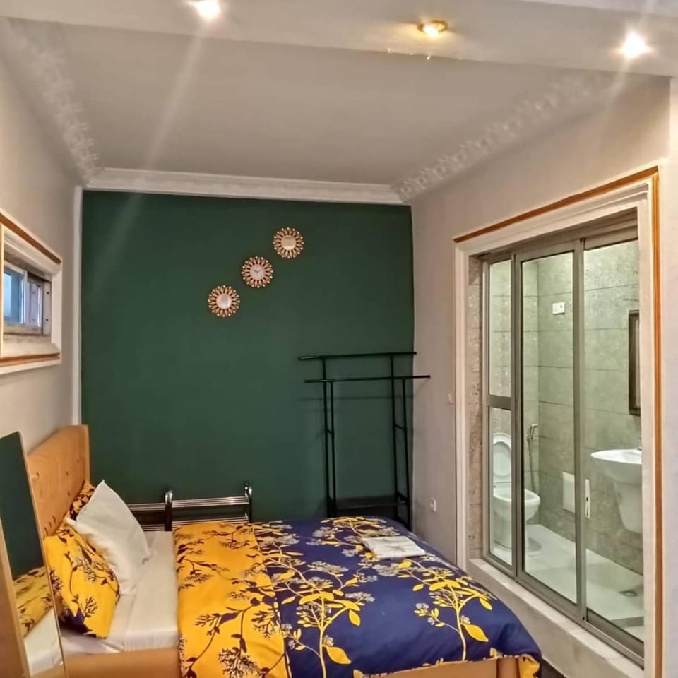 Bed, Living room, Seating area, Bedroom