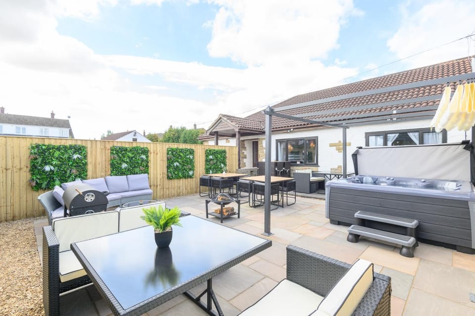 Property building, Patio, Seating area, Dining area