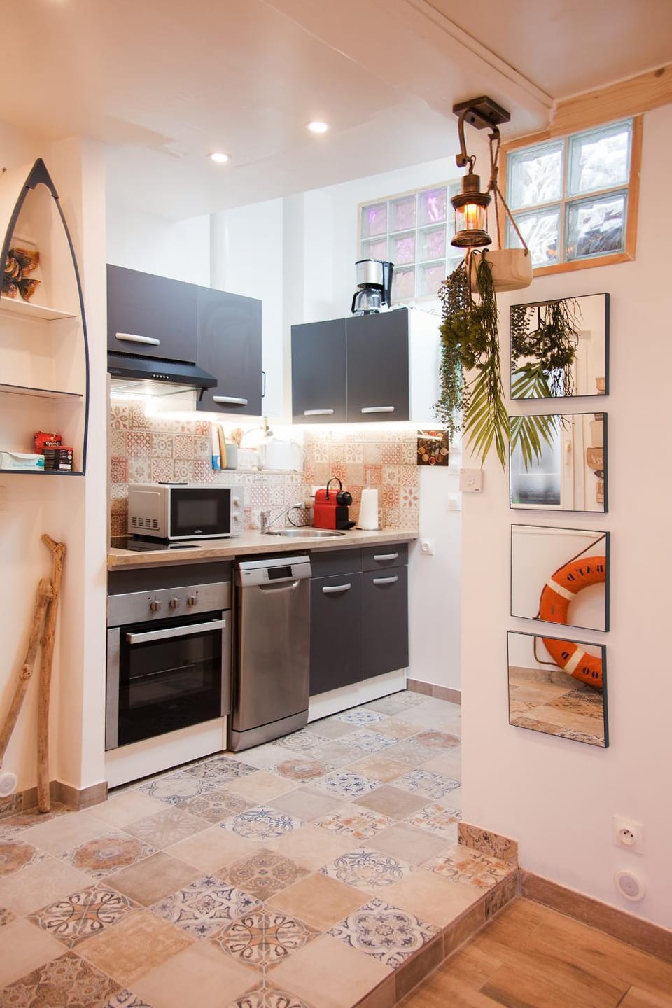 Kitchen or kitchenette, dishwasher, oven, stove